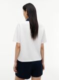 Alb Tricou Polo Cu Croiala Normala De Culoare Aurie Cu Nasturi  Femei